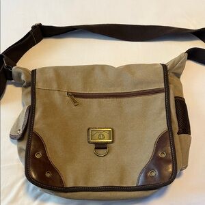 It's Feasible Tan Canvas Messenger Bag